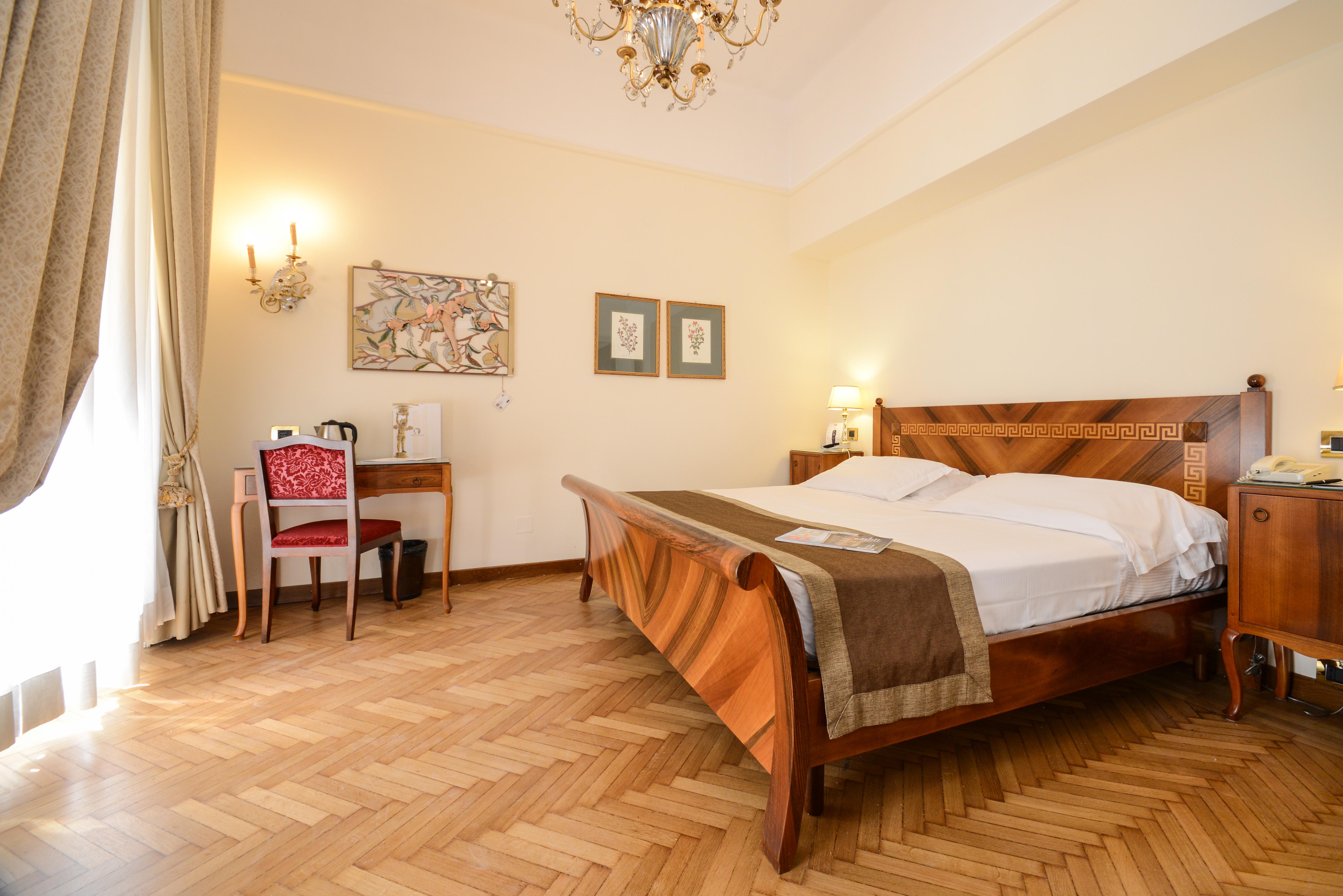 Hotel Vittoria Brescia Exteriör bild A room at the hotel